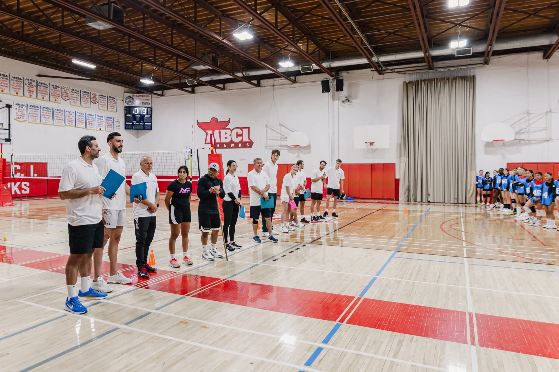 Vision Elite travel team coaches leading athletes