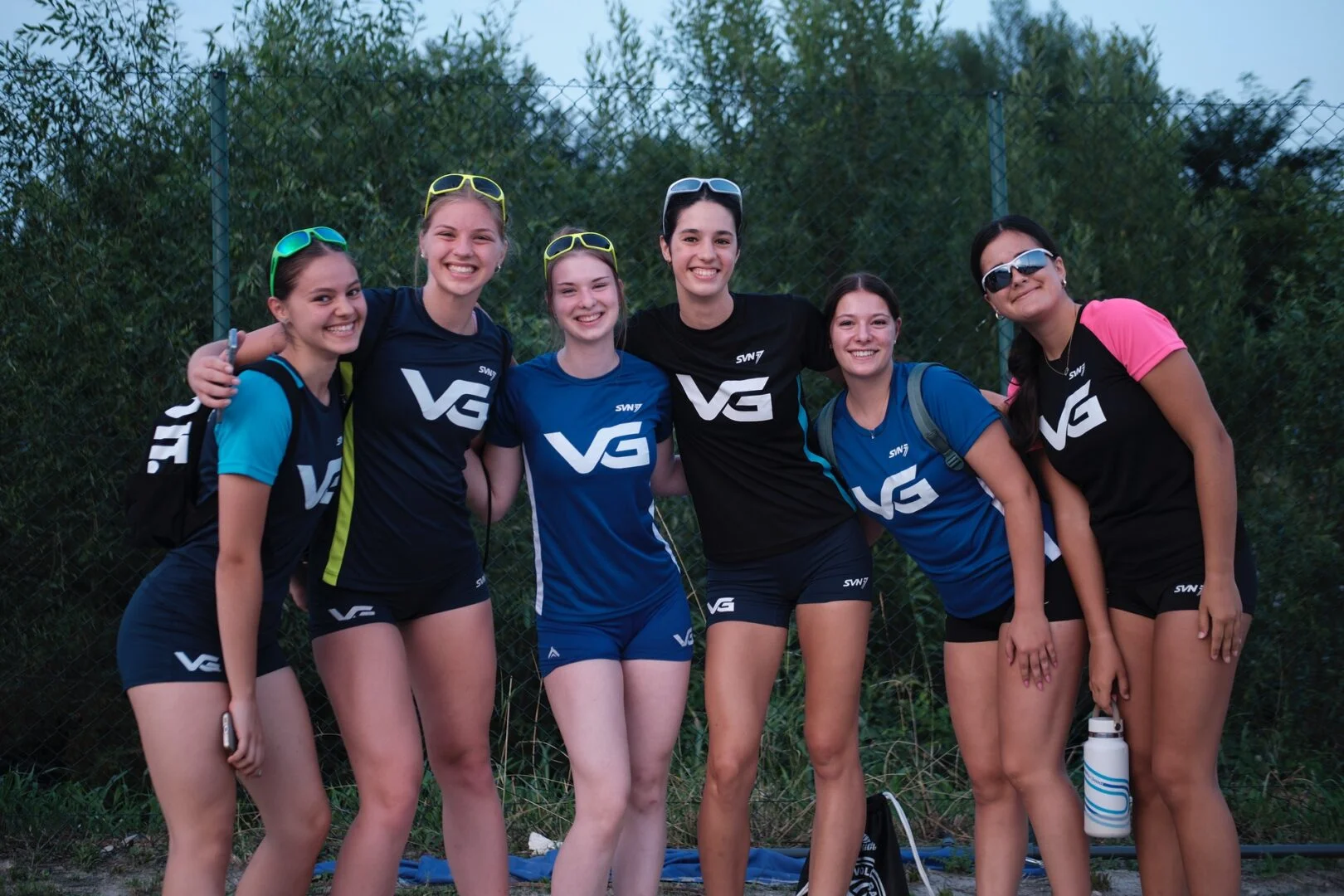 Athletes training outdoors at the Serbia volleyball camp