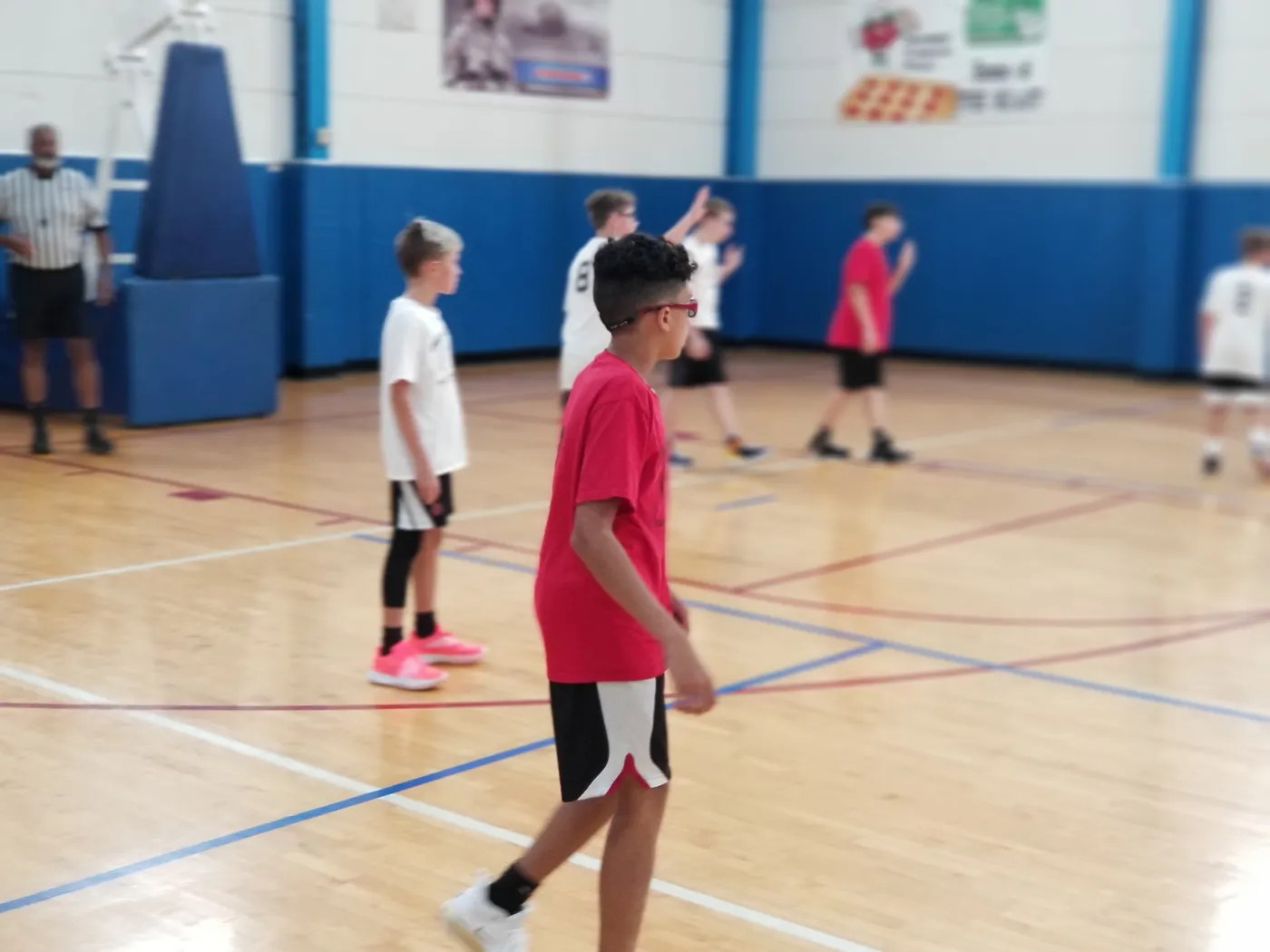 Boys working on ball control during a basketball training session
